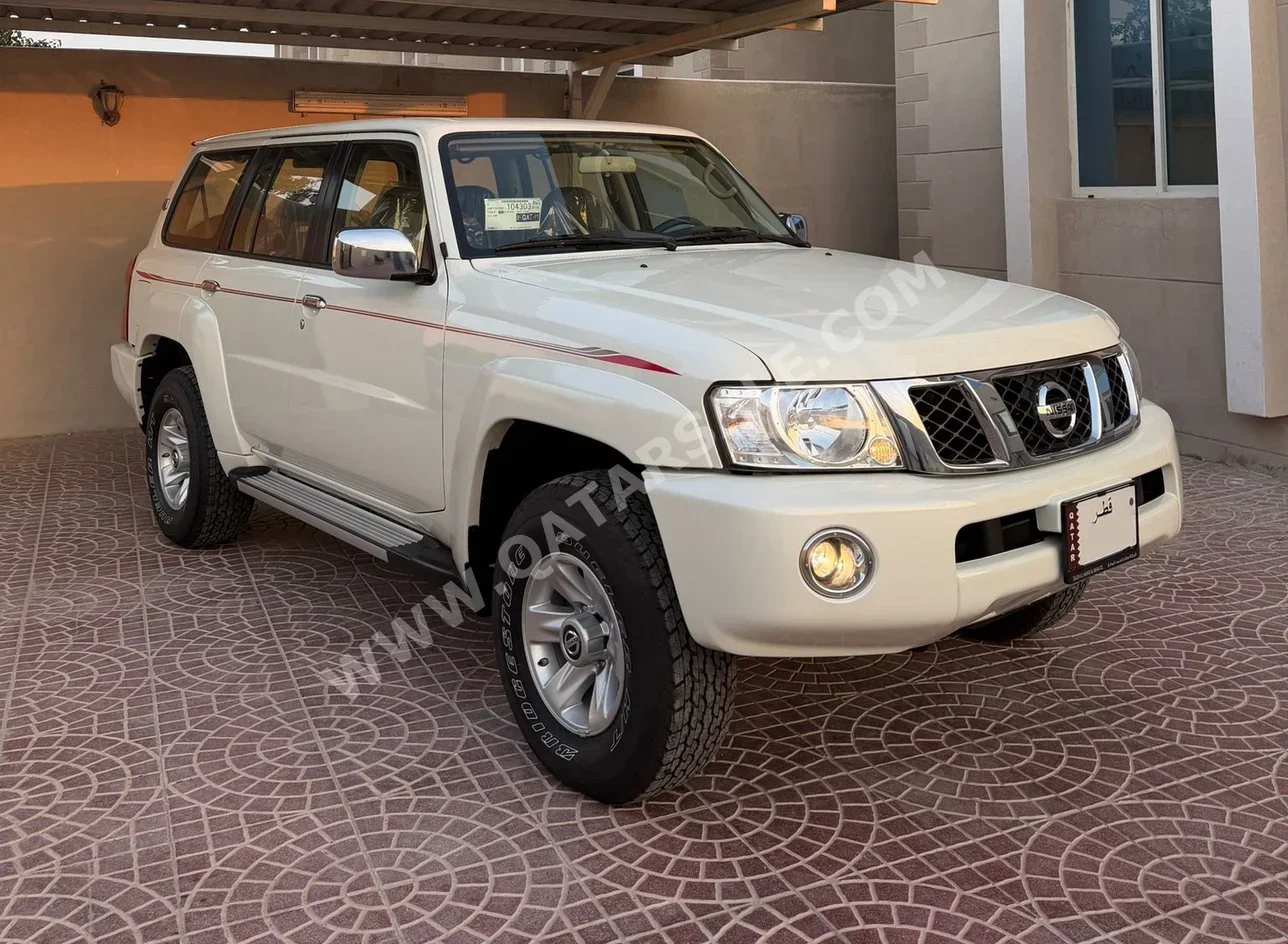 نيسان باترول سفاري الاسطورة 2024 عادي 0 كم 6 سلندر دفع رباعي اس يو في أبيض تحت الضمان