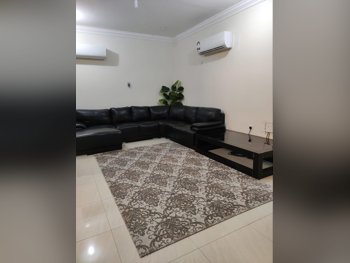 الأرائك والكنب والكراسي شكل L  - جلد صناعي  - أسود