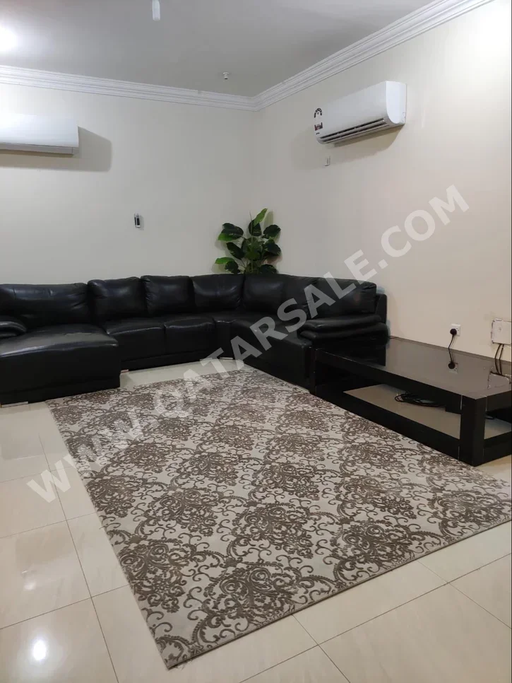 الأرائك والكنب والكراسي شكل L - جلد صناعي - أسود