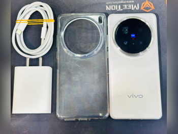 هواتف نقالة فيفو  - اكس  - 100 برو  - تيتانيوم طبيعي  - 512 جيجابايت  - تحت الضمان