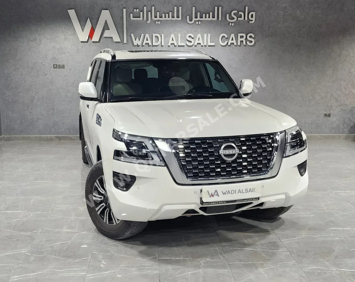 Nissan  Patrol  Titanium  2022  Automatic  107,000 Km  6 Cylinder  Four Wheel Drive (4WD)  SUV  White