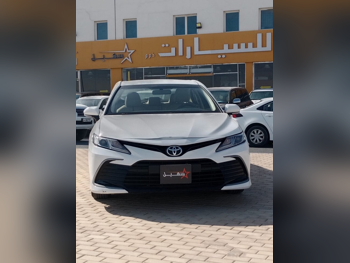 Toyota  Camry  GL  2023  Automatic  105,000 Km  4 Cylinder  Front Wheel Drive (FWD)  Sedan  White