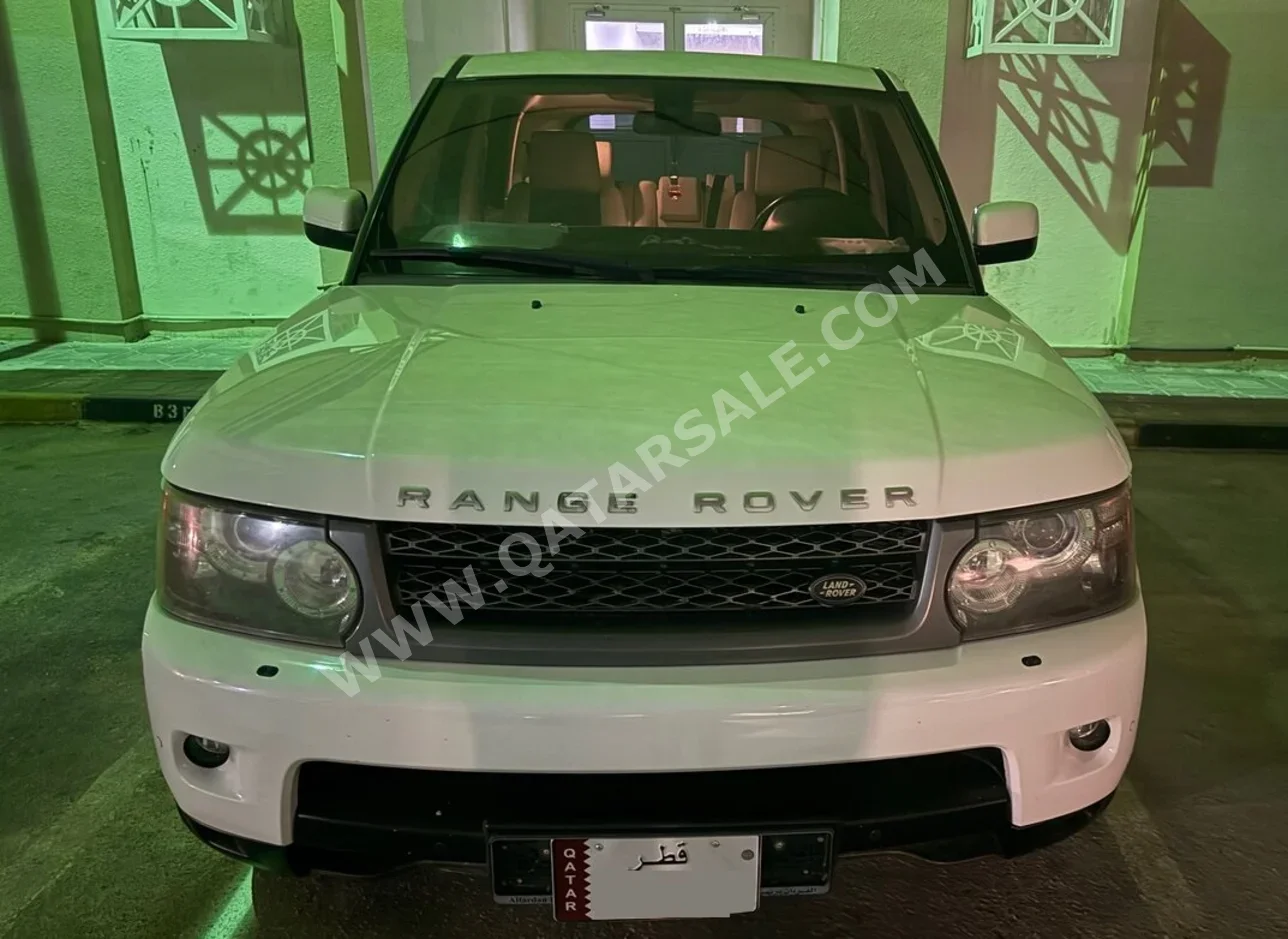 Land Rover  Range Rover  Sport  2011  Automatic  194,000 Km  8 Cylinder  Four Wheel Drive (4WD)  SUV  White