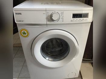 غسالة ملابس & الكل في واحد فيستيل \  غسالة تحميل أمامي  أبيض