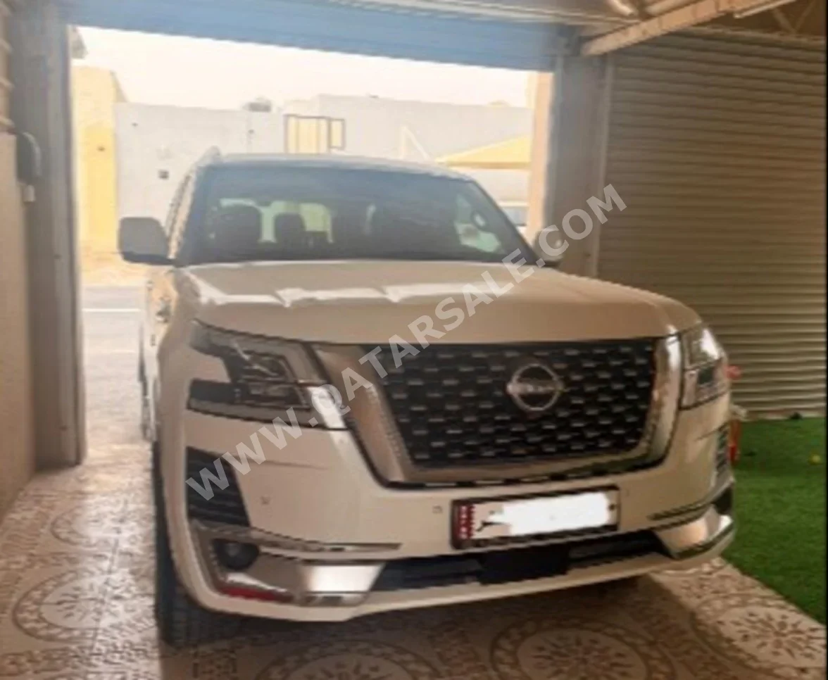 Nissan Patrol Titanium 2023 Automatic 32,000 Km 8 Cylinder Four Wheel Drive (4WD) SUV White With Warranty