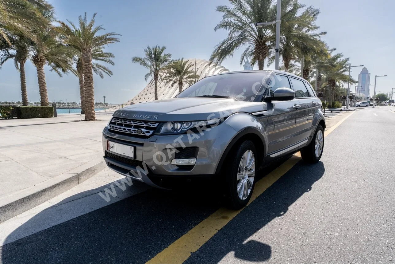 Land Rover  Evoque  Prestige  2015  Automatic  115,078 Km  4 Cylinder  Four Wheel Drive (4WD)  SUV  Gray