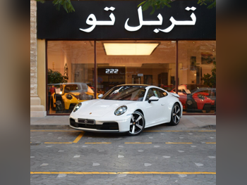 Porsche  911  Carrera  2025  Automatic  543 Km  6 Cylinder  Rear Wheel Drive (RWD)  Coupe / Sport  White  With Warranty