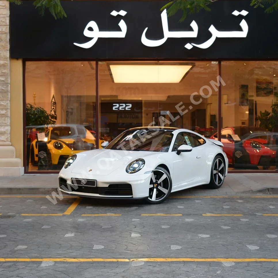 Porsche  911  Carrera  2025  Automatic  543 Km  6 Cylinder  Rear Wheel Drive (RWD)  Coupe / Sport  White  With Warranty