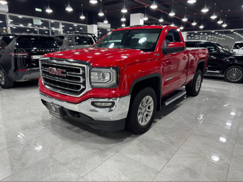 GMC  Sierra  SLE  2016  Automatic  141,000 Km  8 Cylinder  Four Wheel Drive (4WD)  Pick Up  Red