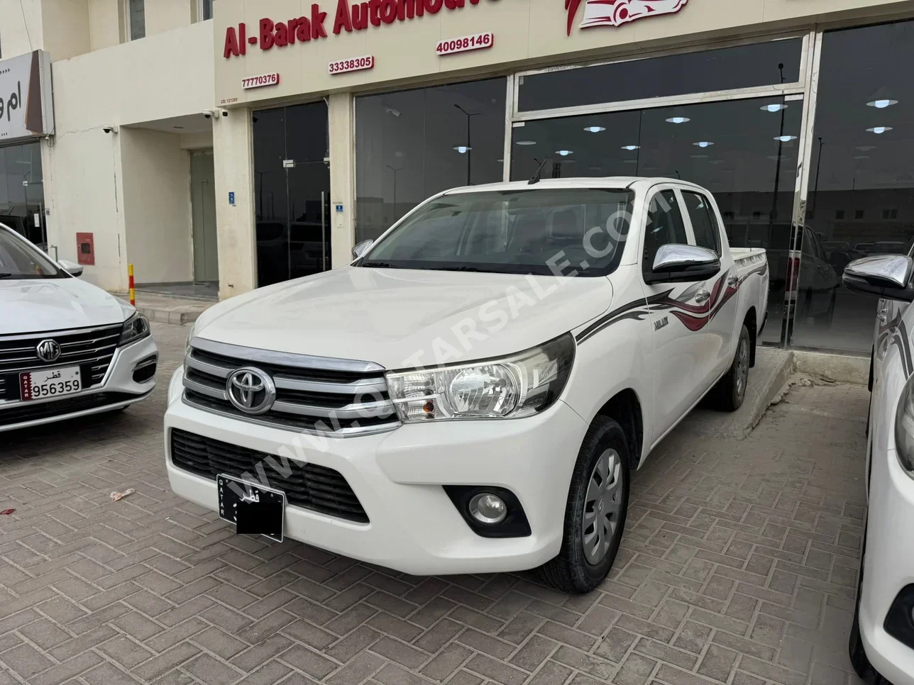 Toyota  Hilux  2020  Automatic  61,000 Km  4 Cylinder  Rear Wheel Drive (RWD)  Pick Up  White