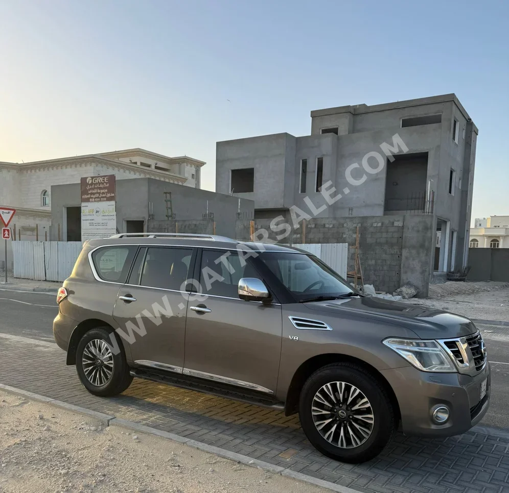 Nissan  Patrol  Platinum  2014  Automatic  235,000 Km  8 Cylinder  Four Wheel Drive (4WD)  SUV  Gray