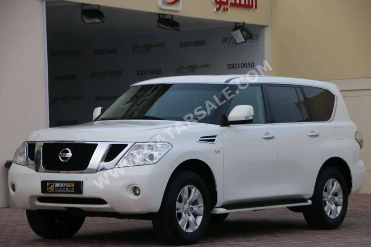 Nissan  Patrol  SE  2013  Automatic  55,000 Km  8 Cylinder  Four Wheel Drive (4WD)  SUV  White