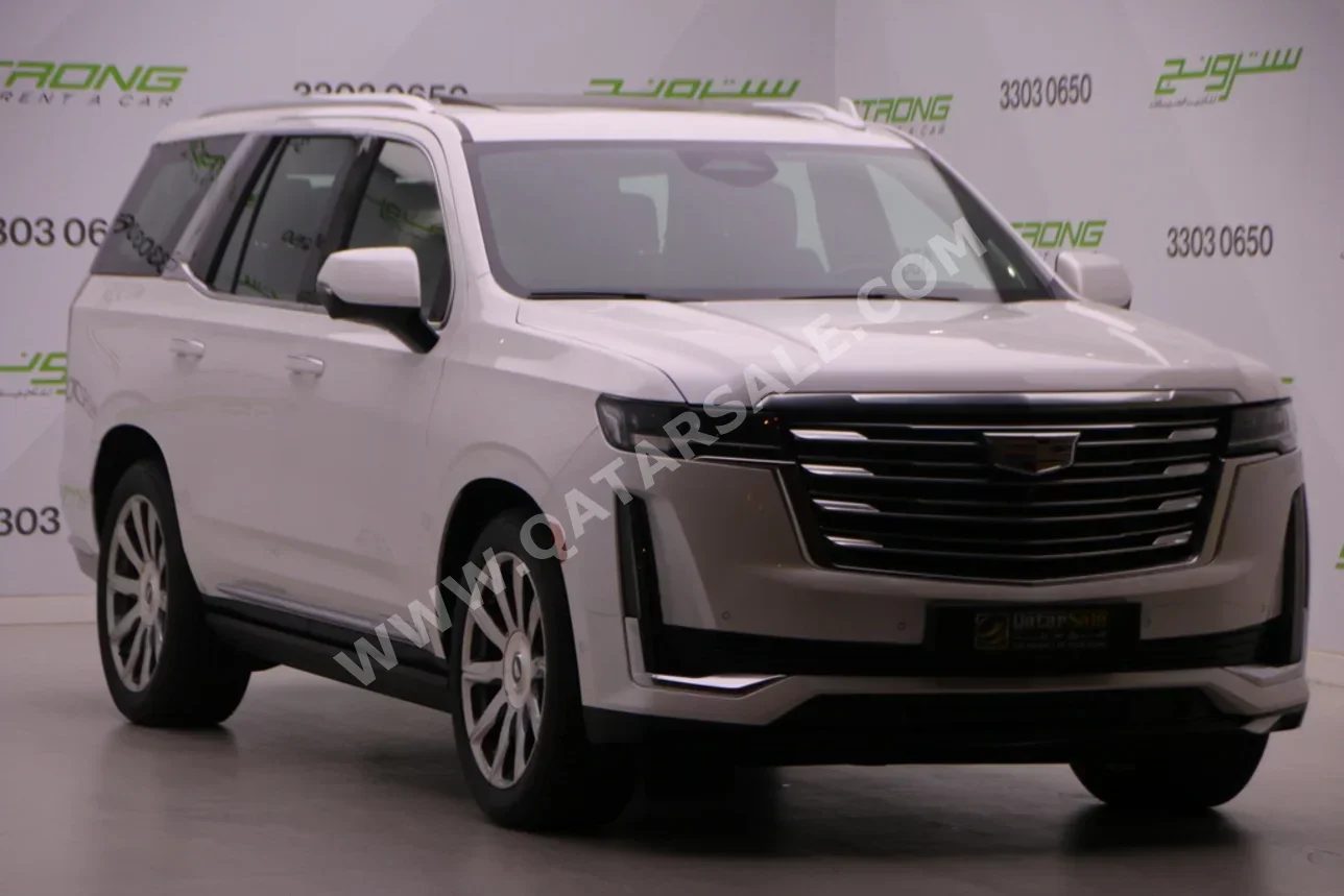 Cadillac  Escalade  Platinum  2023  Automatic  22,000 Km  8 Cylinder  Four Wheel Drive (4WD)  SUV  White  With Warranty