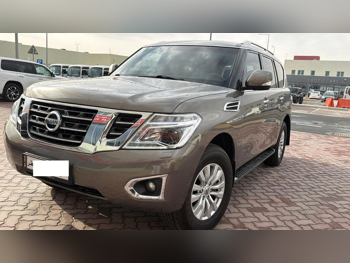Nissan  Patrol  SE  2015  Automatic  285,000 Km  8 Cylinder  Four Wheel Drive (4WD)  SUV  Brown