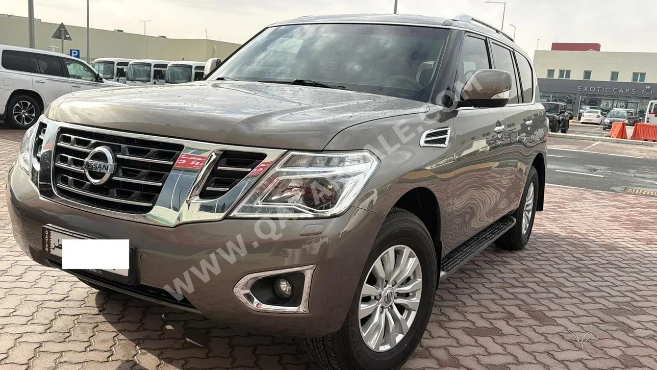 Nissan  Patrol  SE  2015  Automatic  285,000 Km  8 Cylinder  Four Wheel Drive (4WD)  SUV  Brown