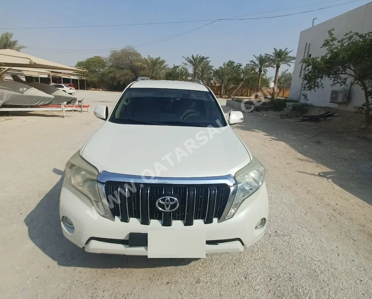 Toyota  Prado  TXL  2014  Automatic  300,000 Km  4 Cylinder  Four Wheel Drive (4WD)  SUV  Pearl