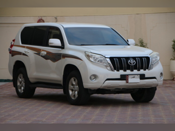 تويوتا  برادو  2015  اوتوماتيك  96,000 كم  4 سلندر  دفع رباعي  اس يو في  أبيض لؤلؤي