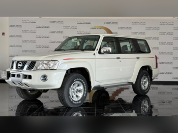 Nissan  Patrol  Safari  2023  Manual  0 Km  6 Cylinder  Four Wheel Drive (4WD)  SUV  White  With Warranty