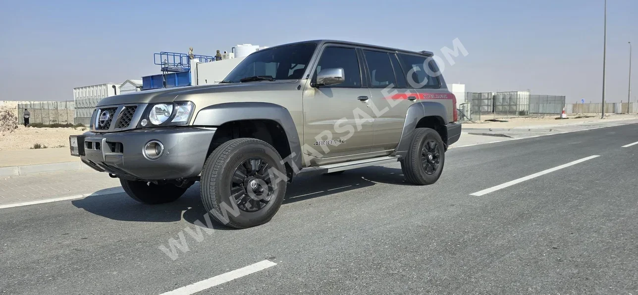 Nissan  Patrol  Super Safari  2019  Automatic  74,000 Km  6 Cylinder  Four Wheel Drive (4WD)  SUV  gray and gold