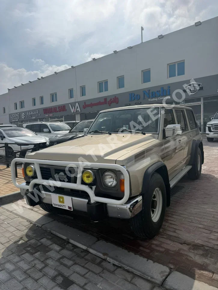 نيسان باترول جي ال 1991 عادي 16,774 كم 6 سلندر دفع رباعي اس يو في ذهبي