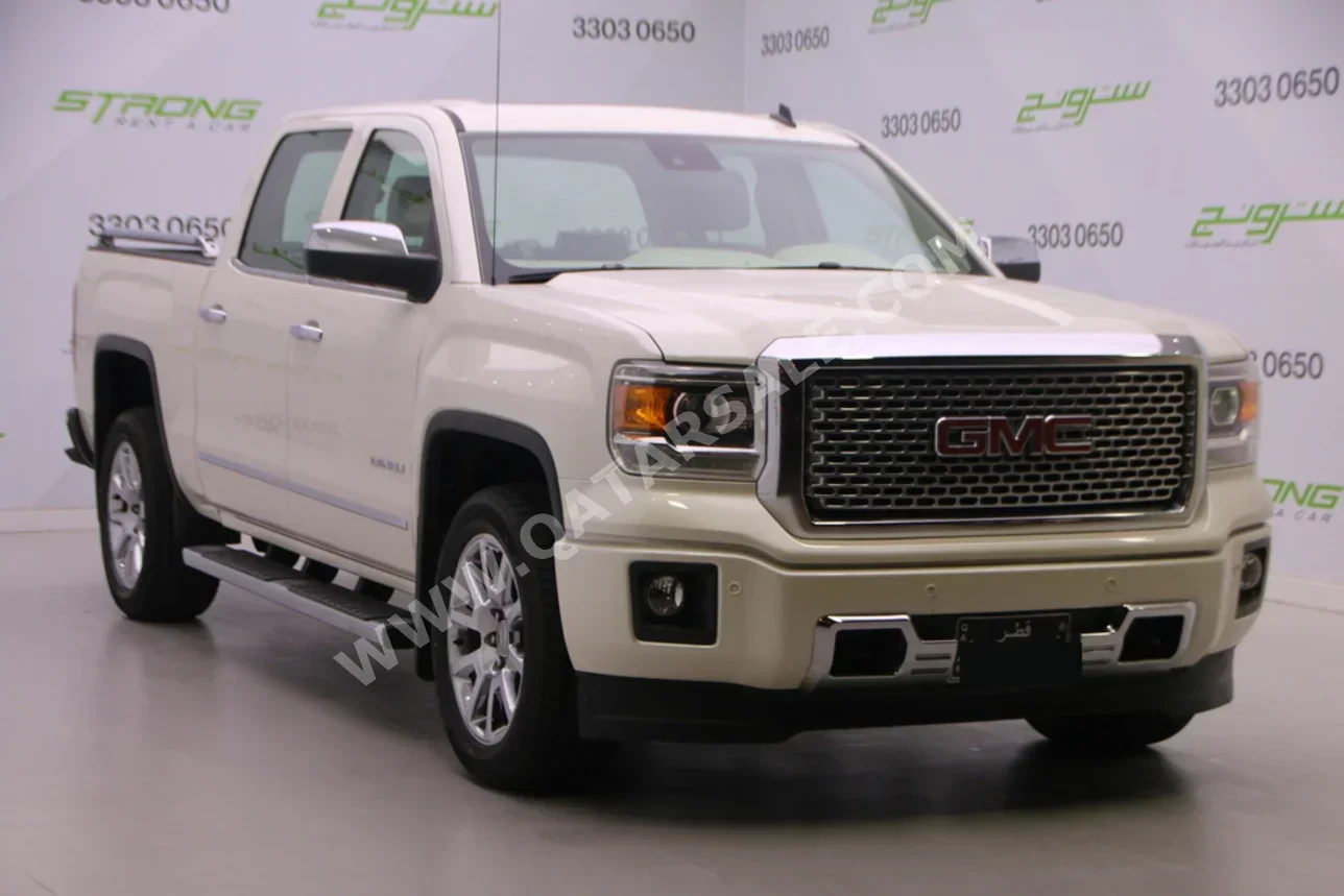 جي ام سي  سييرا  دينالي  2014  اوتوماتيك  62,000 كم  8 سلندر  دفع رباعي  بيكب  أبيض لؤلؤي