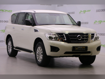 نيسان  باترول  أكس أي  2019  اوتوماتيك  220,000 كم  6 سلندر  دفع رباعي  اس يو في  أبيض