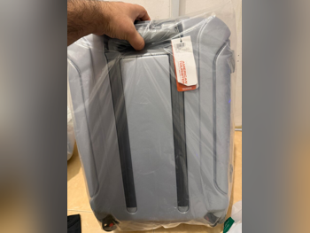 حقائب سفر  - اللون الرمادي  - لكلا الجنسين