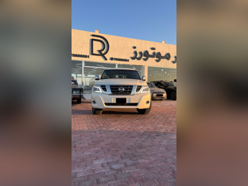 Nissan  Patrol  Platinum  2015  Automatic  202,000 Km  8 Cylinder  Four Wheel Drive (4WD)  SUV  White
