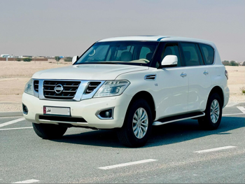 Nissan  Patrol  SE  2015  Automatic  254,000 Km  8 Cylinder  Four Wheel Drive (4WD)  SUV  White