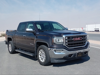 GMC  Sierra  SLE  2016  Automatic  245,000 Km  8 Cylinder  Four Wheel Drive (4WD)  Pick Up  Gray