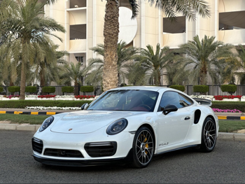 بورش  911  992 توربو اس  2018  اف - 1  59,000 كم  6 سلندر  دفع رباعي  كوبيه \ سبورت  أبيض لؤلؤي  تحت الضمان
