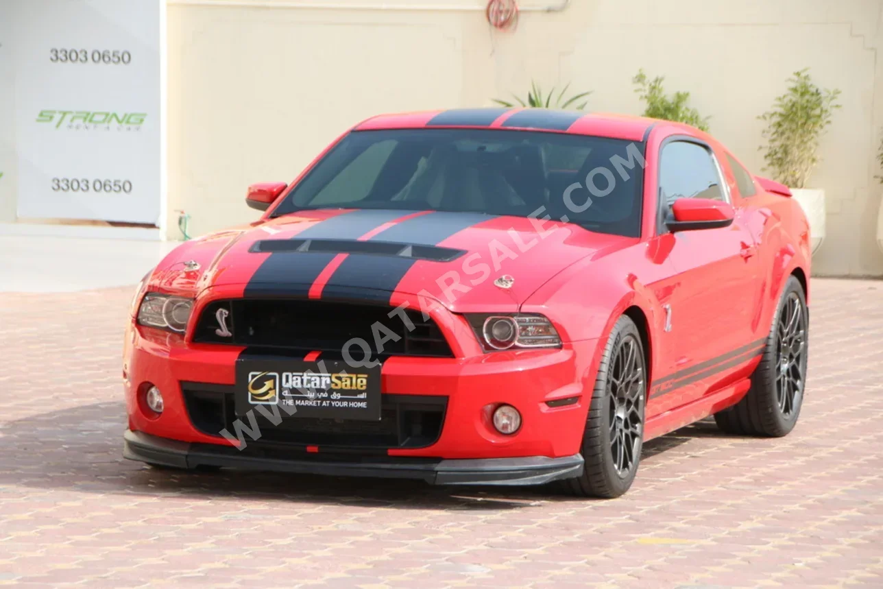 فورد  موستانغ  شيلبي جي تي 500  2014  عادي  50,000 كم  8 سلندر  دفع خلفي  كوبيه \ سبورت  أحمر