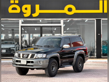 Nissan  Patrol  Safari  2022  Manual  62,000 Km  6 Cylinder  Four Wheel Drive (4WD)  SUV  Black