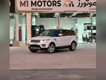Land Rover  Range Rover  Sport  2015  Automatic  137,000 Km  8 Cylinder  Four Wheel Drive (4WD)  SUV  White