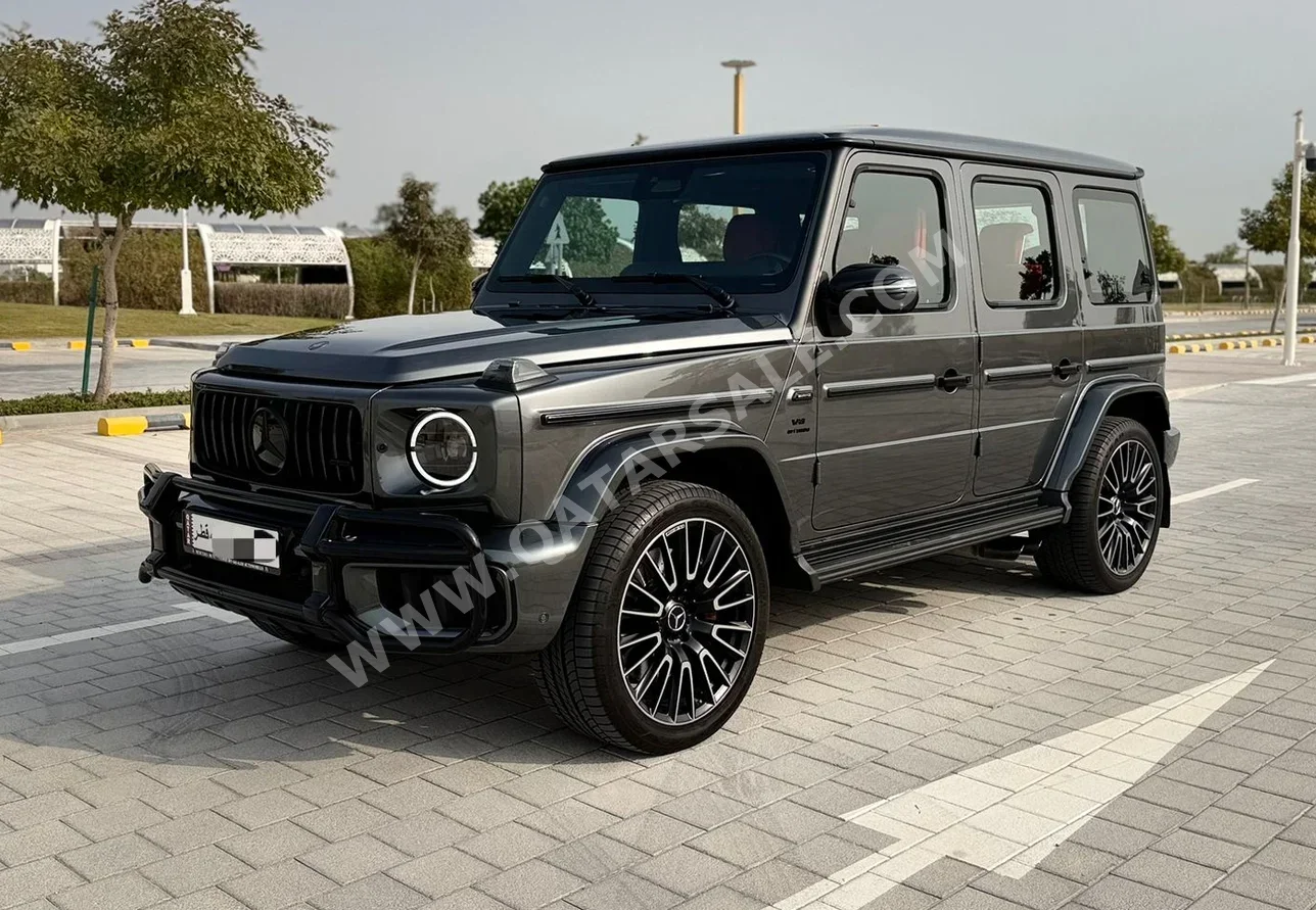 مرسيدس - بنز جي - كلاس 63 اي ام جي 2025 اوتوماتيك 18,000 كم 8 سلندر دفع رباعي اس يو في رمادي تحت الضمان