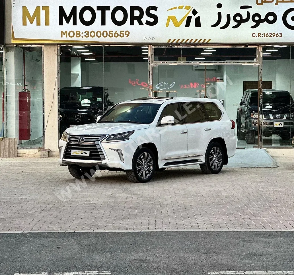 لكزس ال اكس 570 2016 اوتوماتيك 500,000 كم 8 سلندر دفع رباعي اس يو في أبيض
