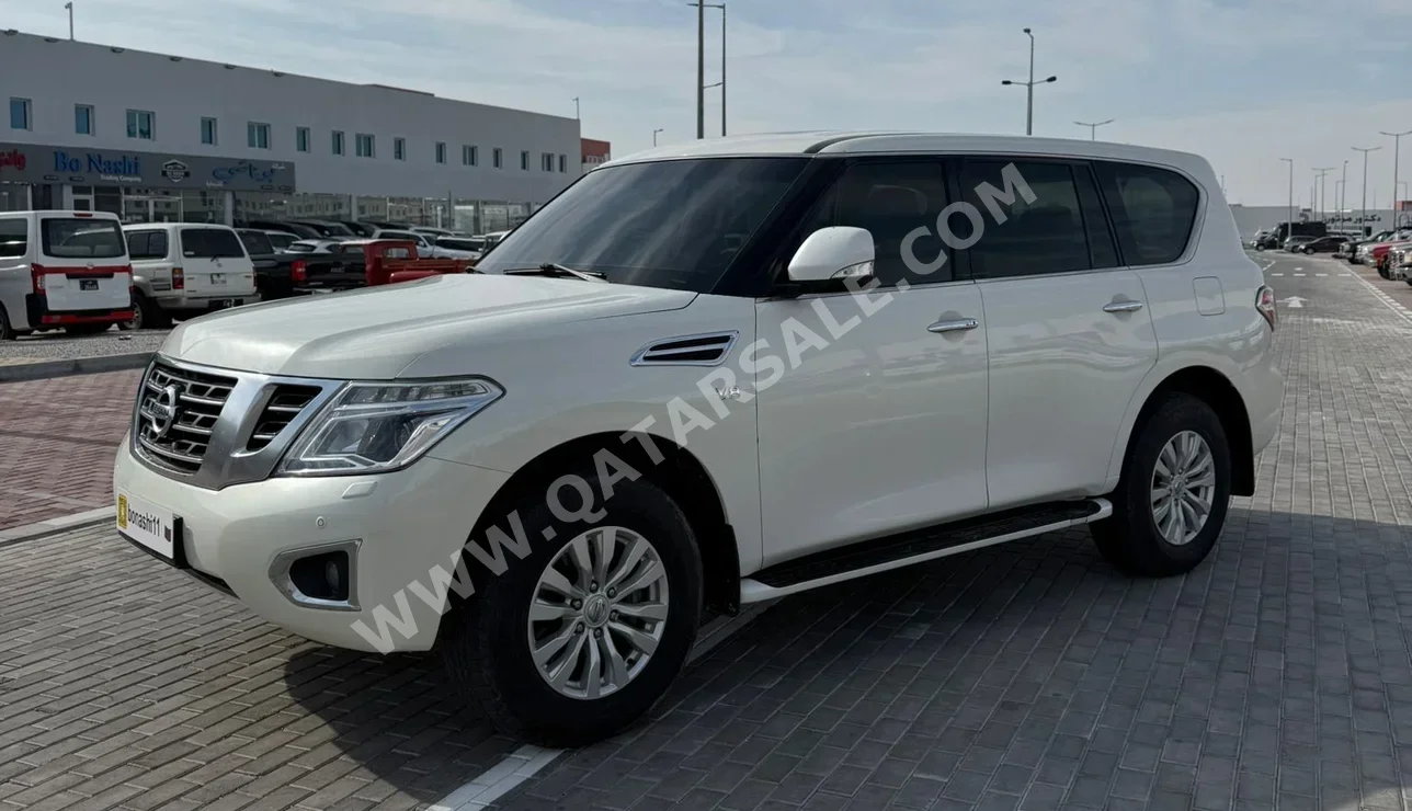 Nissan  Patrol  SE  2016  Automatic  143,000 Km  8 Cylinder  Four Wheel Drive (4WD)  SUV  White
