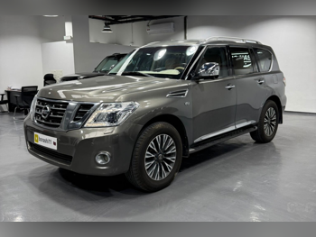 Nissan  Patrol  Platinum  2014  Automatic  326,000 Km  8 Cylinder  Four Wheel Drive (4WD)  SUV  Brown