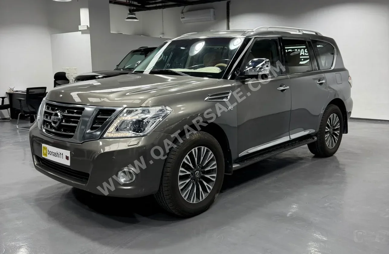 Nissan  Patrol  Platinum  2014  Automatic  326,000 Km  8 Cylinder  Four Wheel Drive (4WD)  SUV  Brown