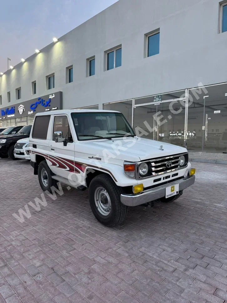 Toyota  Land Cruiser  Hard Top  1993  Manual  140,000 Km  6 Cylinder  Four Wheel Drive (4WD)  SUV  White