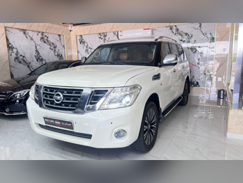 Nissan  Patrol  Platinum  2014  Automatic  358,000 Km  8 Cylinder  Four Wheel Drive (4WD)  SUV  White