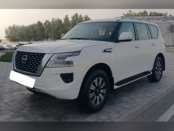 Nissan  Patrol  SE  2024  Automatic  104,000 Km  8 Cylinder  Four Wheel Drive (4WD)  SUV  White