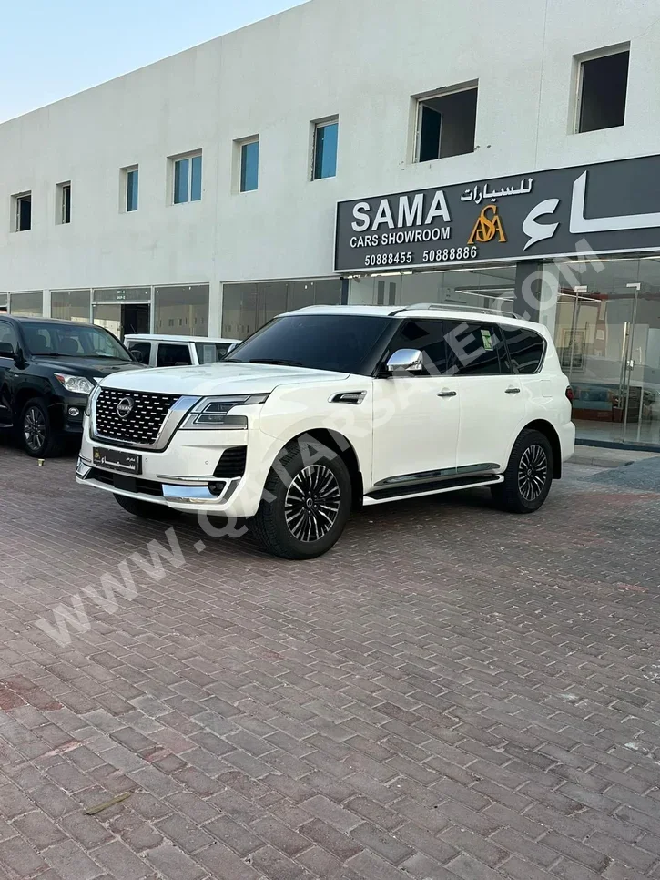 Nissan  Patrol  Platinum  2023  Automatic  30,000 Km  6 Cylinder  Four Wheel Drive (4WD)  SUV  White