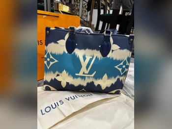 حقيبة توتي  - لويس فيتون  - أزرق  - جلد صناعي  - نسائي