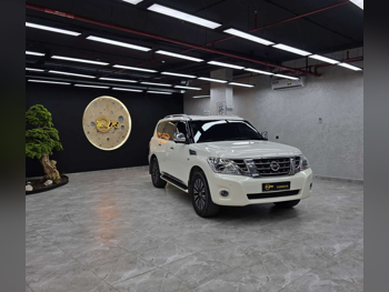 نيسان  باترول  بلاتنيوم  2014  اوتوماتيك  300,000 كم  8 سلندر  دفع رباعي  اس يو في  أبيض