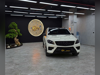 مرسيدس - بنز  ام ال  350  2013  اوتوماتيك  150,000 كم  6 سلندر  دفع رباعي  اس يو في  أبيض