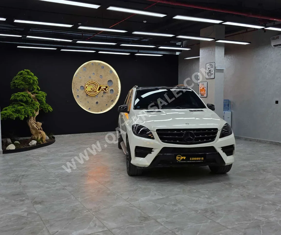 مرسيدس - بنز  ام ال  350  2013  اوتوماتيك  150,000 كم  6 سلندر  دفع رباعي  اس يو في  أبيض