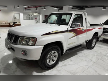Nissan  Patrol  Pickup  2014  Manual  266,000 Km  6 Cylinder  Four Wheel Drive (4WD)  Pick Up  White