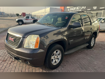 GMC  Yukon  2010  Automatic  300,000 Km  8 Cylinder  Four Wheel Drive (4WD)  SUV  Black