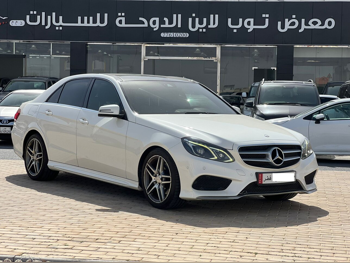 مرسيدس - بنز  اي - كلاس  300  2014  اوتوماتيك  211,000 كم  6 سلندر  دفع خلفي  سيدان  أبيض